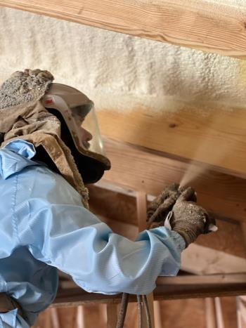 A Spray Foam by IOK technician spraying foam